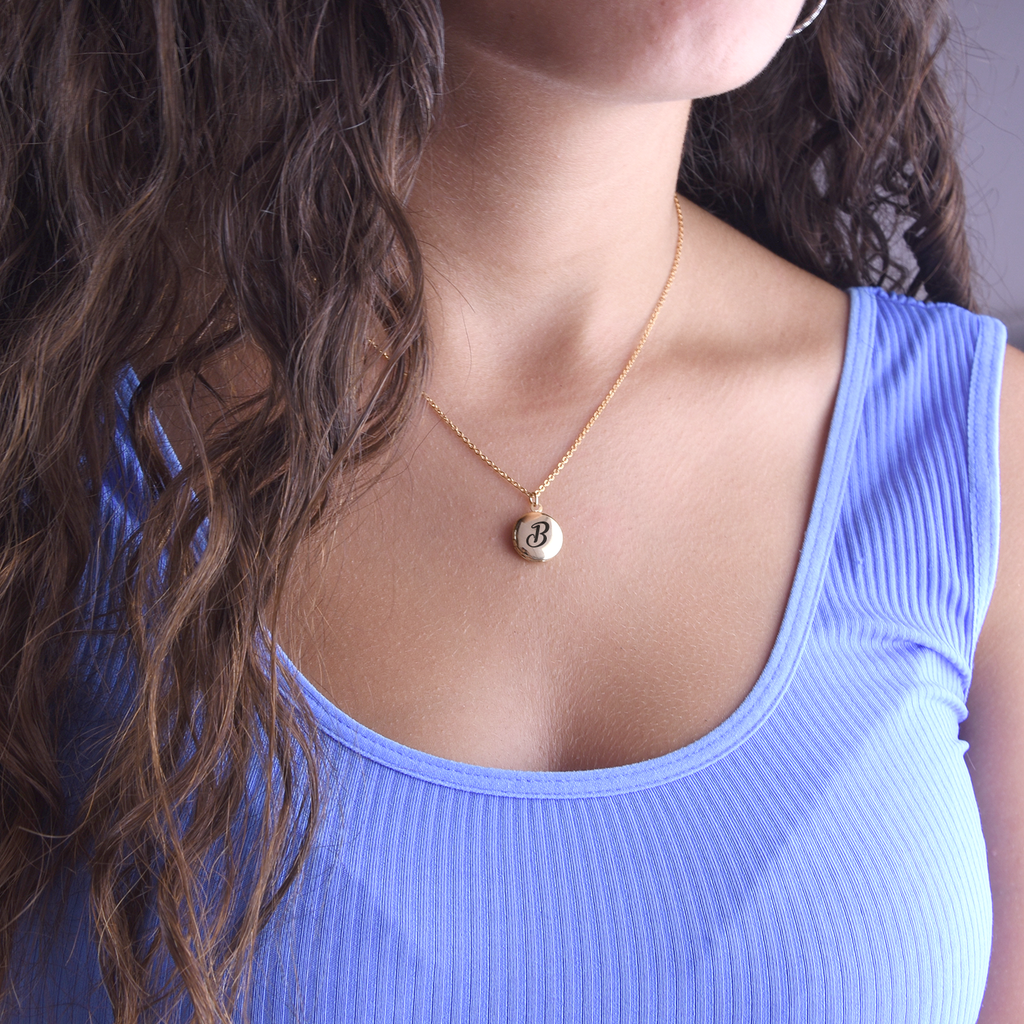 Tiny round locket necklace