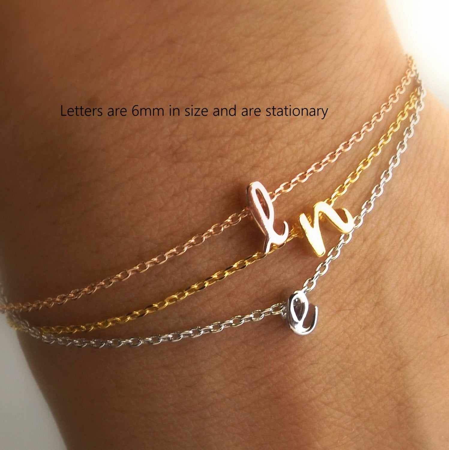 Dainty silver gold rose gold lowercase cursive script initial bracelet –  Gemnotic