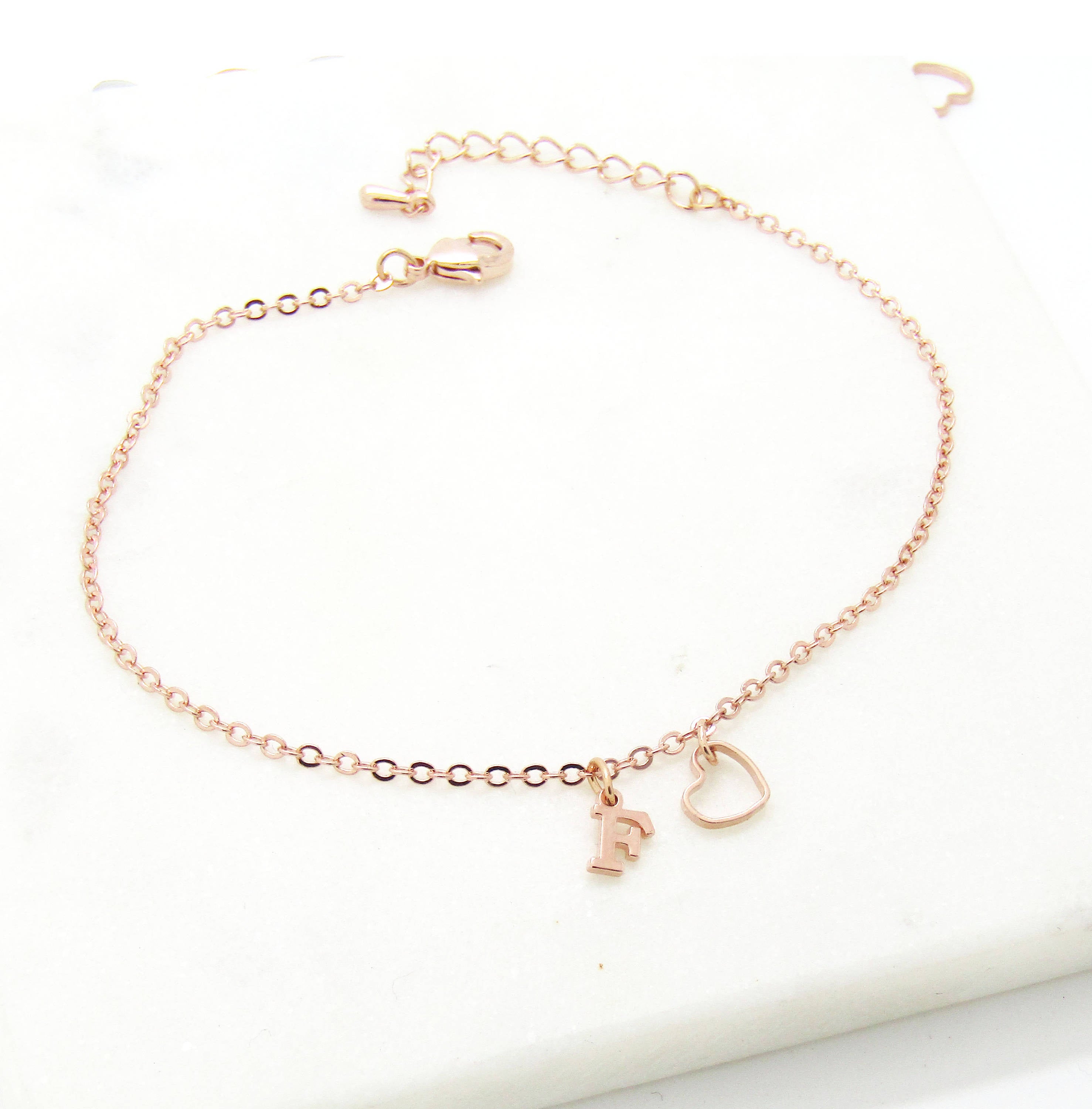 Dainty silver gold rose gold lowercase cursive script initial bracelet –  Gemnotic