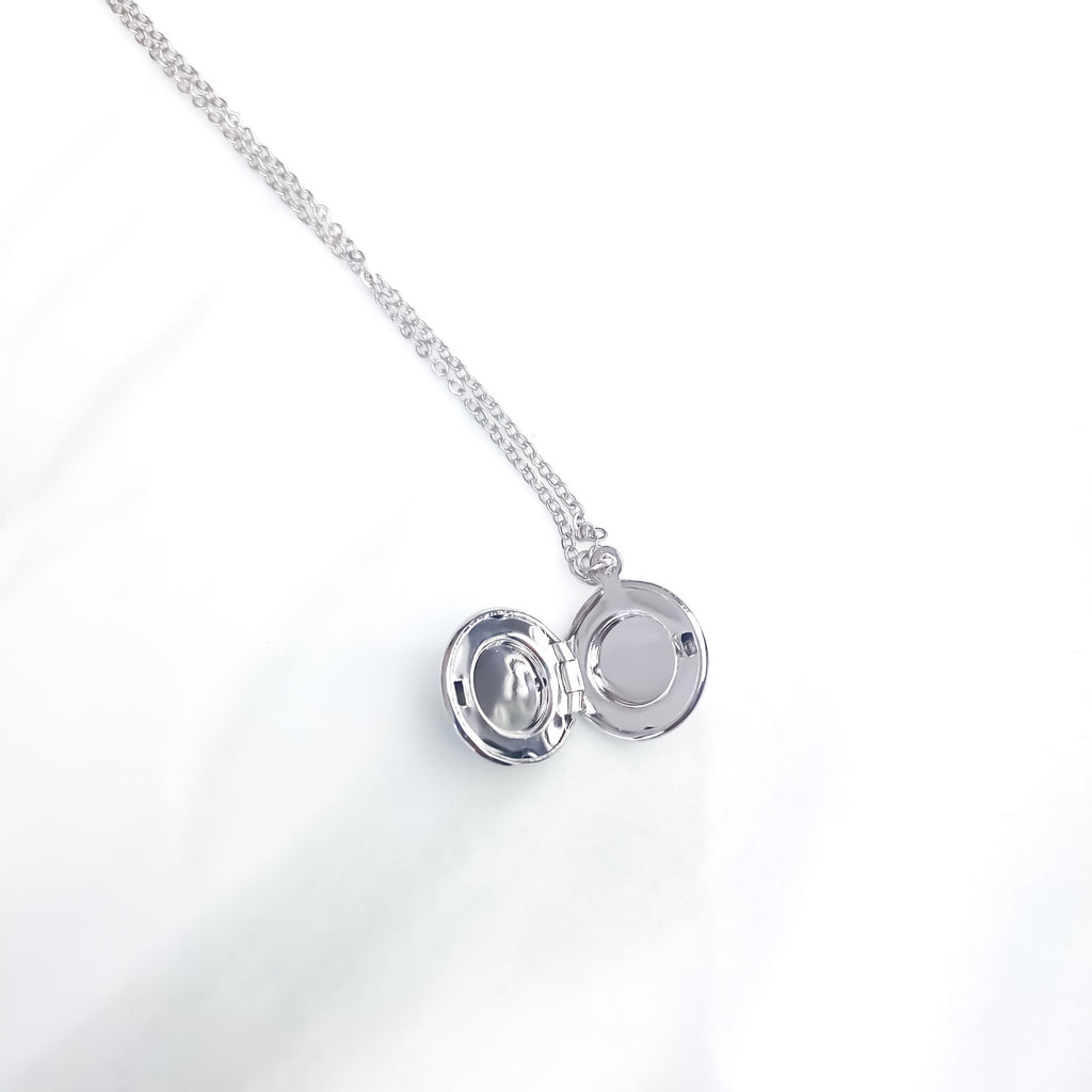 Tiny round locket necklace